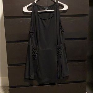 Black peplum top with lace up detail on sides